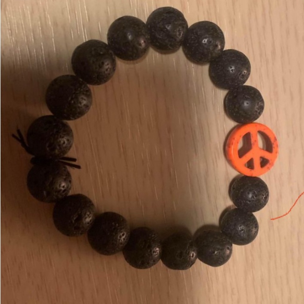 Lava rock diffuser Bracelet with Orange Peace Charm